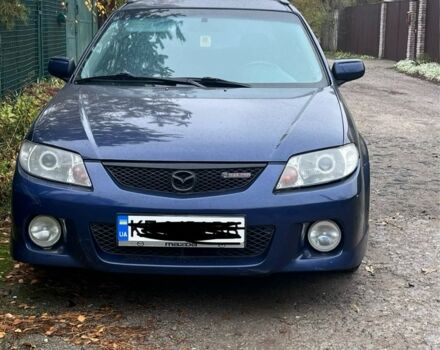 Синий Мазда Протеж, объемом двигателя 2 л и пробегом 298 тыс. км за 3700 $, фото 1 на Automoto.ua