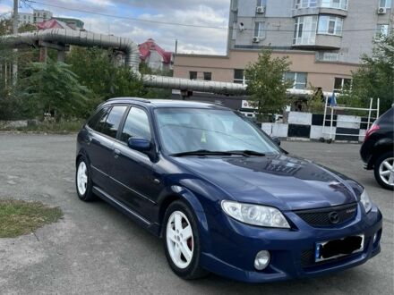 Синий Мазда Протеж, объемом двигателя 2 л и пробегом 290 тыс. км за 3700 $, фото 1 на Automoto.ua