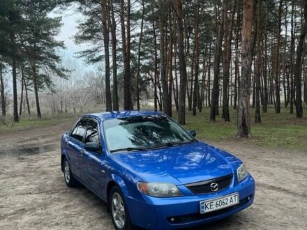 Синій Мазда Протеже, об'ємом двигуна 2 л та пробігом 220 тис. км за 2300 $, фото 1 на Automoto.ua