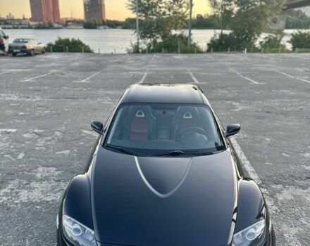 Черный Мазда РХ-8, объемом двигателя 2.5 л и пробегом 115 тыс. км за 6500 $, фото 1 на Automoto.ua