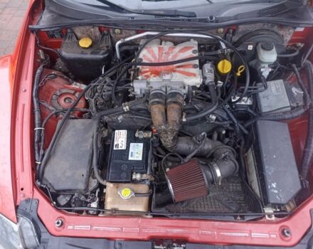 Красный Мазда РХ-8, объемом двигателя 2.5 л и пробегом 180 тыс. км за 3550 $, фото 2 на Automoto.ua