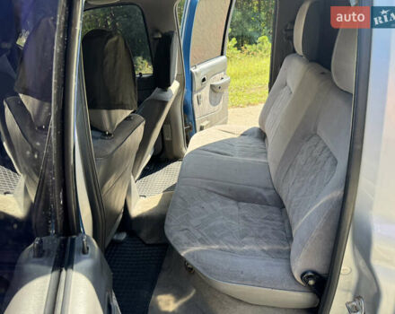 Белый Мазда Трибьют, объемом двигателя 2.5 л и пробегом 387 тыс. км за 4750 $, фото 12 на Automoto.ua