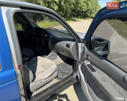 Белый Мазда Трибьют, объемом двигателя 2.5 л и пробегом 387 тыс. км за 4750 $, фото 10 на Automoto.ua