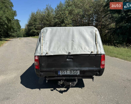 Белый Мазда Трибьют, объемом двигателя 2.5 л и пробегом 387 тыс. км за 4750 $, фото 6 на Automoto.ua