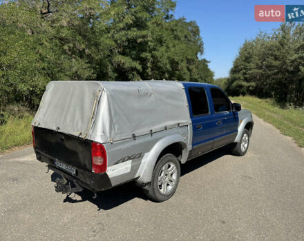 Белый Мазда Трибьют, объемом двигателя 2.5 л и пробегом 387 тыс. км за 4750 $, фото 4 на Automoto.ua