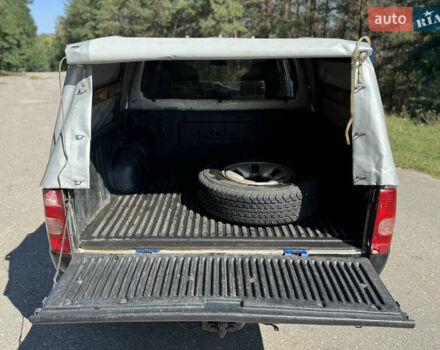 Белый Мазда Трибьют, объемом двигателя 2.5 л и пробегом 387 тыс. км за 4750 $, фото 14 на Automoto.ua