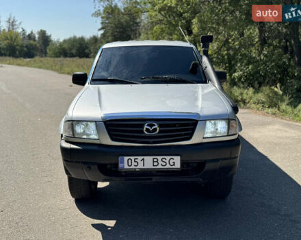 Белый Мазда Трибьют, объемом двигателя 2.5 л и пробегом 387 тыс. км за 4750 $, фото 7 на Automoto.ua