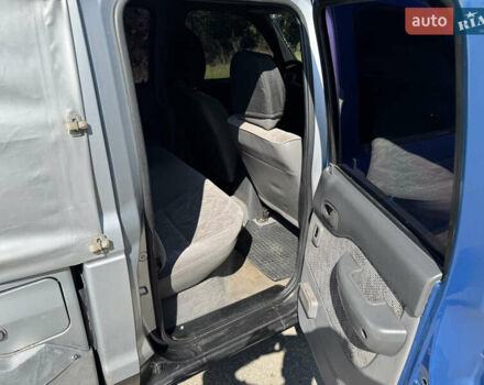 Белый Мазда Трибьют, объемом двигателя 2.5 л и пробегом 387 тыс. км за 4750 $, фото 11 на Automoto.ua