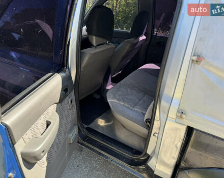 Белый Мазда Трибьют, объемом двигателя 2.5 л и пробегом 387 тыс. км за 4750 $, фото 9 на Automoto.ua