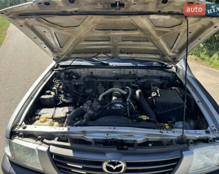 Белый Мазда Трибьют, объемом двигателя 2.5 л и пробегом 387 тыс. км за 4750 $, фото 16 на Automoto.ua