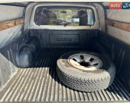 Белый Мазда Трибьют, объемом двигателя 2.5 л и пробегом 387 тыс. км за 4750 $, фото 15 на Automoto.ua