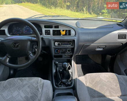 Белый Мазда Трибьют, объемом двигателя 2.5 л и пробегом 387 тыс. км за 4750 $, фото 13 на Automoto.ua