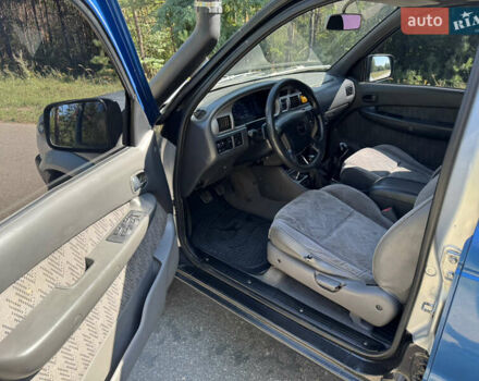 Белый Мазда Трибьют, объемом двигателя 2.5 л и пробегом 387 тыс. км за 4750 $, фото 8 на Automoto.ua