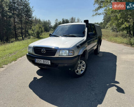 Білий Мазда Трибьют, об'ємом двигуна 2.5 л та пробігом 387 тис. км за 4750 $, фото 1 на Automoto.ua