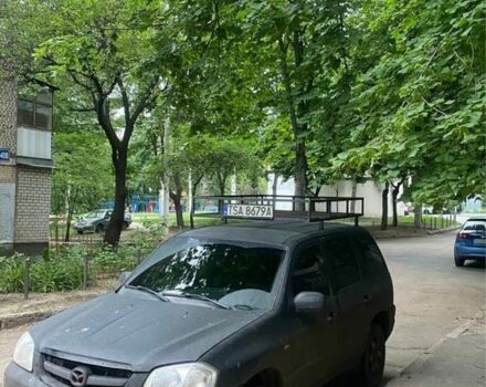 Чорний Мазда Трибьют, об'ємом двигуна 2 л та пробігом 200 тис. км за 3500 $, фото 2 на Automoto.ua