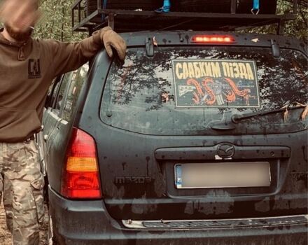 Чорний Мазда Трибьют, об'ємом двигуна 2 л та пробігом 200 тис. км за 3500 $, фото 4 на Automoto.ua