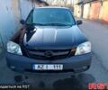 Чорний Мазда Трибьют, об'ємом двигуна 20 л та пробігом 280 тис. км за 3130 $, фото 1 на Automoto.ua