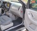 Черный Мазда Трибьют, объемом двигателя 2.97 л и пробегом 300 тыс. км за 4700 $, фото 2 на Automoto.ua