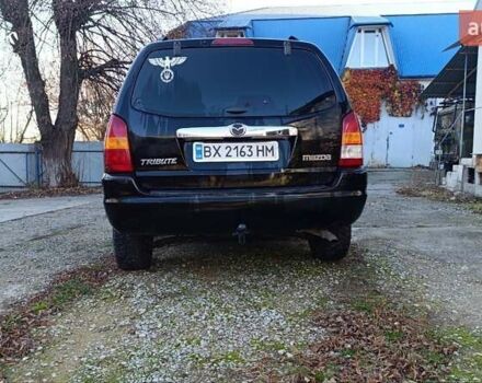 Чорний Мазда Трибьют, об'ємом двигуна 2 л та пробігом 267 тис. км за 4800 $, фото 9 на Automoto.ua