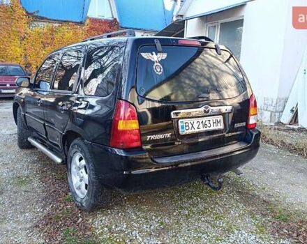 Чорний Мазда Трибьют, об'ємом двигуна 2 л та пробігом 267 тис. км за 4800 $, фото 8 на Automoto.ua