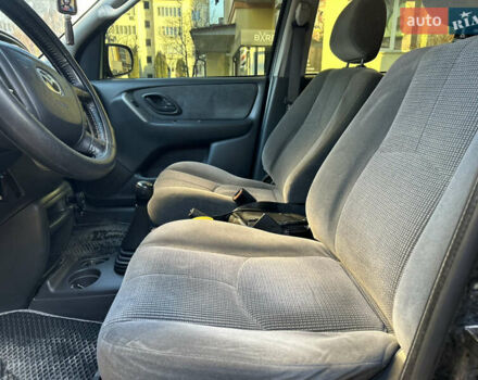 Черный Мазда Трибьют, объемом двигателя 2 л и пробегом 267 тыс. км за 4999 $, фото 31 на Automoto.ua