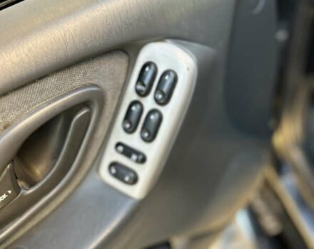 Черный Мазда Трибьют, объемом двигателя 2 л и пробегом 267 тыс. км за 4999 $, фото 24 на Automoto.ua