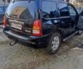 Чорний Мазда Трибьют, об'ємом двигуна 2 л та пробігом 267 тис. км за 4800 $, фото 12 на Automoto.ua