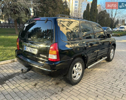 Черный Мазда Трибьют, объемом двигателя 2 л и пробегом 267 тыс. км за 4999 $, фото 13 на Automoto.ua