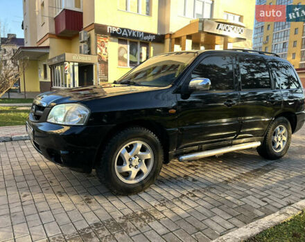 Черный Мазда Трибьют, объемом двигателя 2 л и пробегом 267 тыс. км за 4999 $, фото 3 на Automoto.ua