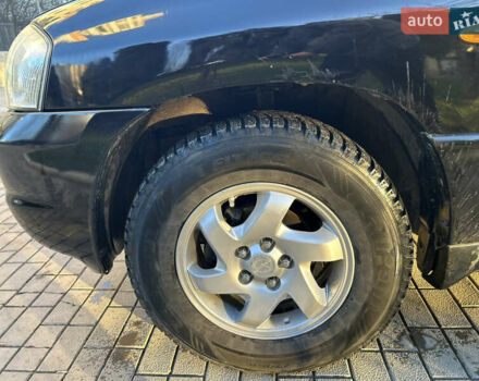 Черный Мазда Трибьют, объемом двигателя 2 л и пробегом 267 тыс. км за 4999 $, фото 21 на Automoto.ua