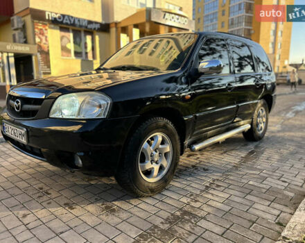 Черный Мазда Трибьют, объемом двигателя 2 л и пробегом 267 тыс. км за 4999 $, фото 23 на Automoto.ua