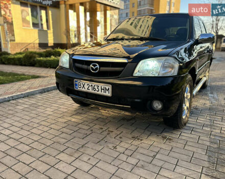 Черный Мазда Трибьют, объемом двигателя 2 л и пробегом 267 тыс. км за 4999 $, фото 6 на Automoto.ua