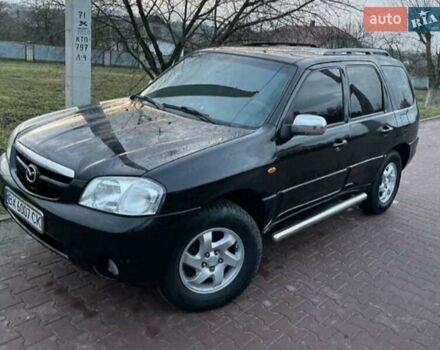 Чорний Мазда Трибьют, об'ємом двигуна 2 л та пробігом 260 тис. км за 4800 $, фото 5 на Automoto.ua