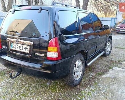 Чорний Мазда Трибьют, об'ємом двигуна 2 л та пробігом 267 тис. км за 4800 $, фото 6 на Automoto.ua