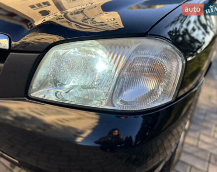 Черный Мазда Трибьют, объемом двигателя 2 л и пробегом 267 тыс. км за 4999 $, фото 7 на Automoto.ua