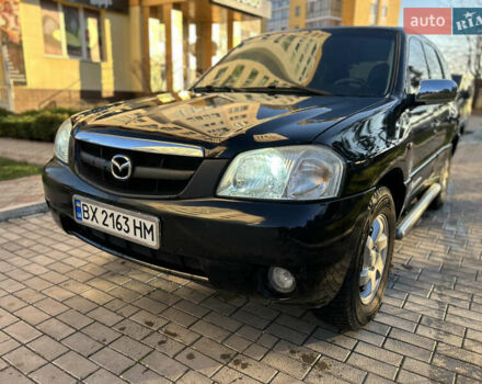 Черный Мазда Трибьют, объемом двигателя 2 л и пробегом 267 тыс. км за 4999 $, фото 5 на Automoto.ua