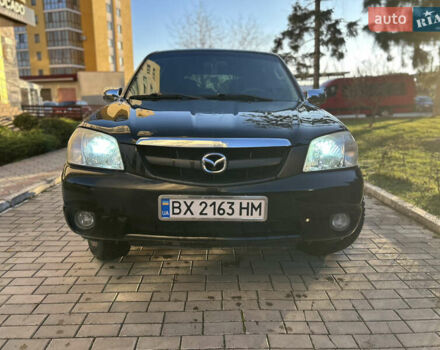 Черный Мазда Трибьют, объемом двигателя 2 л и пробегом 267 тыс. км за 4999 $, фото 2 на Automoto.ua