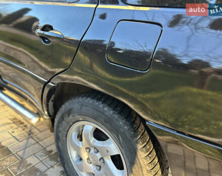 Черный Мазда Трибьют, объемом двигателя 2 л и пробегом 267 тыс. км за 4999 $, фото 18 на Automoto.ua