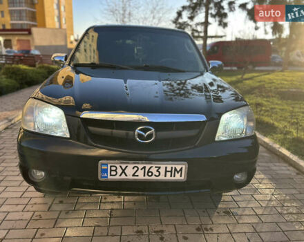 Черный Мазда Трибьют, объемом двигателя 2 л и пробегом 267 тыс. км за 4999 $, фото 9 на Automoto.ua