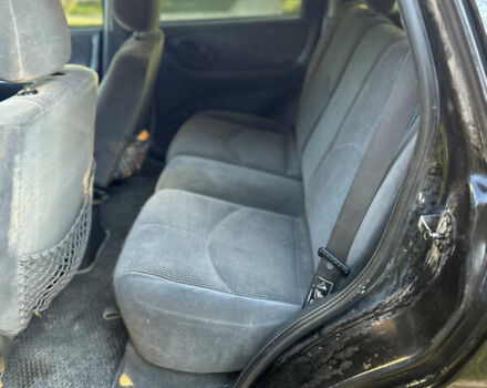 Черный Мазда Трибьют, объемом двигателя 2 л и пробегом 267 тыс. км за 4999 $, фото 32 на Automoto.ua