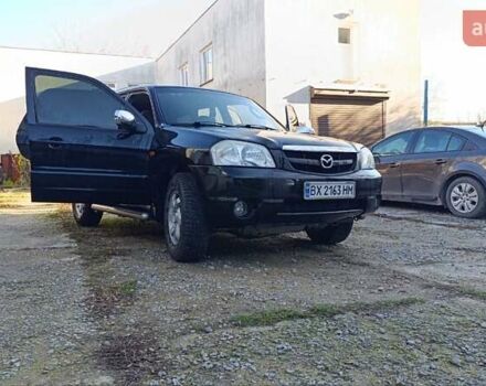 Чорний Мазда Трибьют, об'ємом двигуна 2 л та пробігом 267 тис. км за 4800 $, фото 7 на Automoto.ua