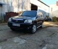 Чорний Мазда Трибьют, об'ємом двигуна 2 л та пробігом 267 тис. км за 4800 $, фото 1 на Automoto.ua