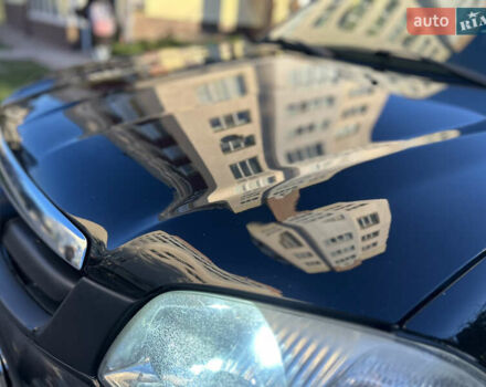 Черный Мазда Трибьют, объемом двигателя 2 л и пробегом 267 тыс. км за 4999 $, фото 8 на Automoto.ua