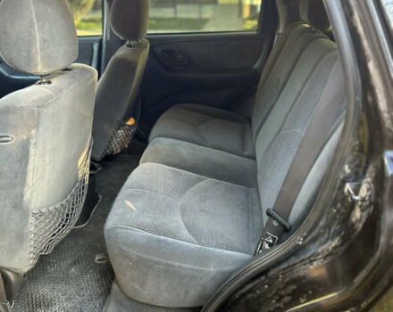 Черный Мазда Трибьют, объемом двигателя 2 л и пробегом 267 тыс. км за 4999 $, фото 33 на Automoto.ua