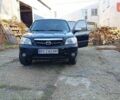Чорний Мазда Трибьют, об'ємом двигуна 2 л та пробігом 267 тис. км за 4800 $, фото 3 на Automoto.ua
