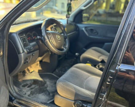 Черный Мазда Трибьют, объемом двигателя 2 л и пробегом 267 тыс. км за 4999 $, фото 27 на Automoto.ua