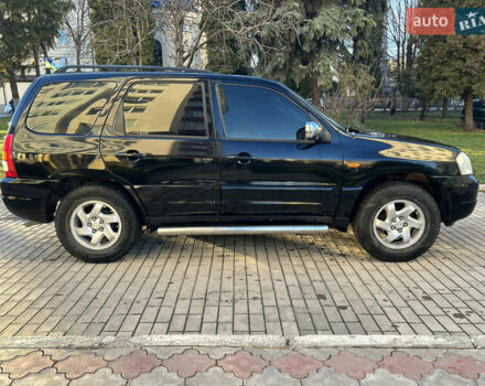 Черный Мазда Трибьют, объемом двигателя 2 л и пробегом 267 тыс. км за 4999 $, фото 10 на Automoto.ua