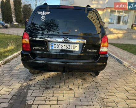 Черный Мазда Трибьют, объемом двигателя 2 л и пробегом 267 тыс. км за 4999 $, фото 16 на Automoto.ua