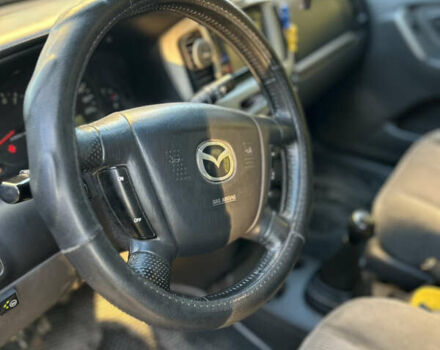Черный Мазда Трибьют, объемом двигателя 2 л и пробегом 267 тыс. км за 4999 $, фото 26 на Automoto.ua