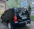 Черный Мазда Трибьют, объемом двигателя 2.3 л и пробегом 150 тыс. км за 5500 $, фото 2 на Automoto.ua